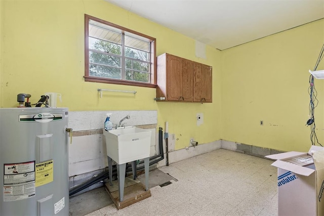 104951 S 3440th Rd, Meeker, OK 74855 - washroom with electric water heater, cabinet space, electric dryer hookup, and light floors