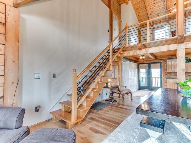 15701 S Pennsylvania Ave, Oklahoma City, OK 73170 - staircase featuring high vaulted ceiling, a wooden ceiling with exposed beams, and wood finished floors