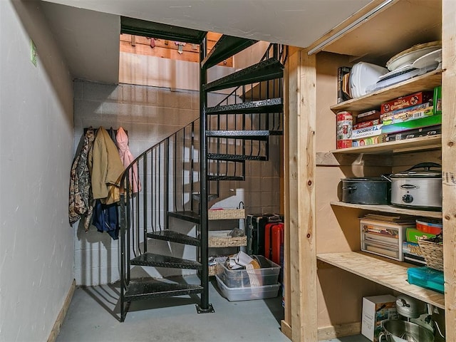 15701 S Pennsylvania Ave, Oklahoma City, OK 73170 - stairway with baseboards and concrete floors