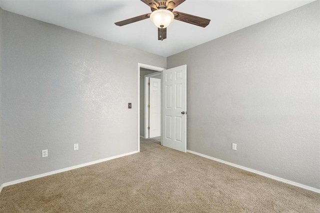 1709 Rocky Mountain Way, Edmond, OK 73003 - unfurnished room featuring ceiling fan and carpet flooring