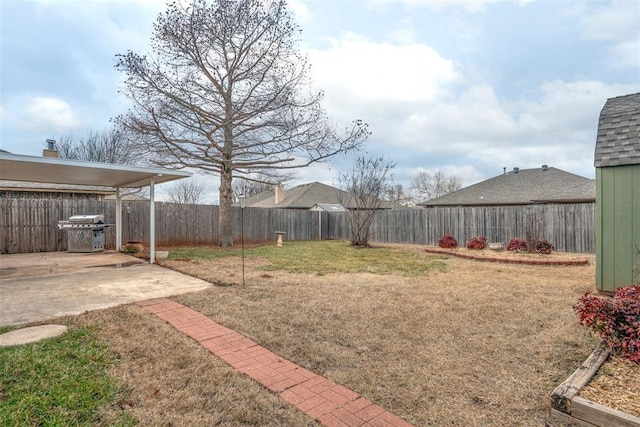 1709 Rocky Mountain Way, Edmond, OK 73003 - fenced backyard featuring a patio