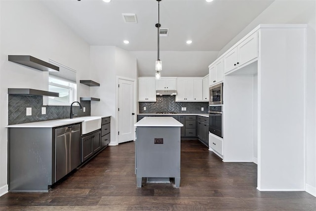 808 Scully Rd, Yukon, OK 73099 - kitchen featuring open shelves, stainless steel appliances, a center island, tasteful backsplash, and recessed lighting