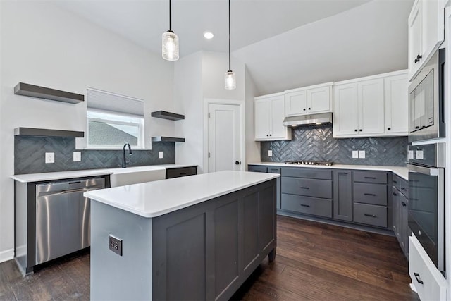 808 Scully Rd, Yukon, OK 73099 - kitchen featuring open shelves, appliances with stainless steel finishes, gray cabinets, white cabinetry, and a center island