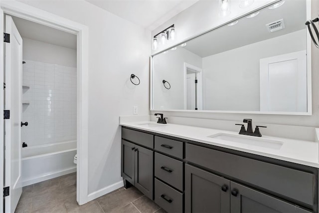 808 Scully Rd, Yukon, OK 73099 - full bath with double vanity, tile patterned flooring, and washtub / shower combination