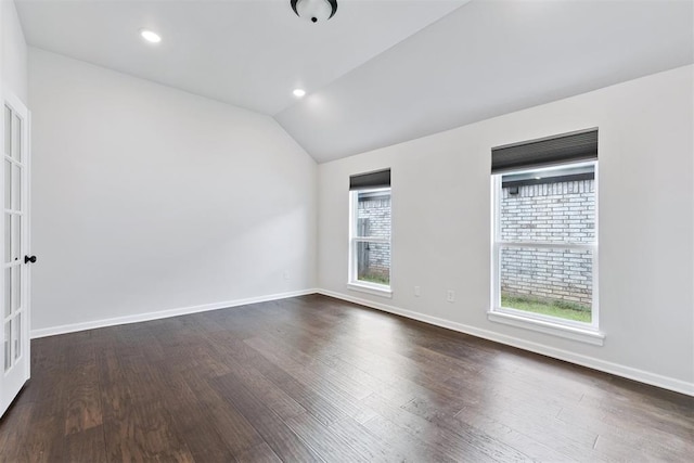 808 Scully Rd, Yukon, OK 73099 - unfurnished room with vaulted ceiling, dark wood-style flooring, and recessed lighting