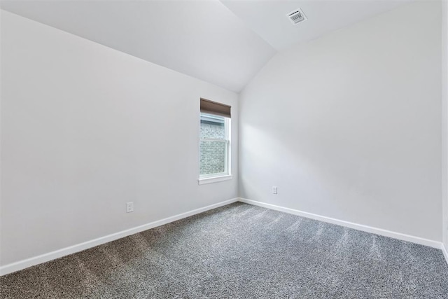 808 Scully Rd, Yukon, OK 73099 - carpeted spare room with vaulted ceiling and baseboards