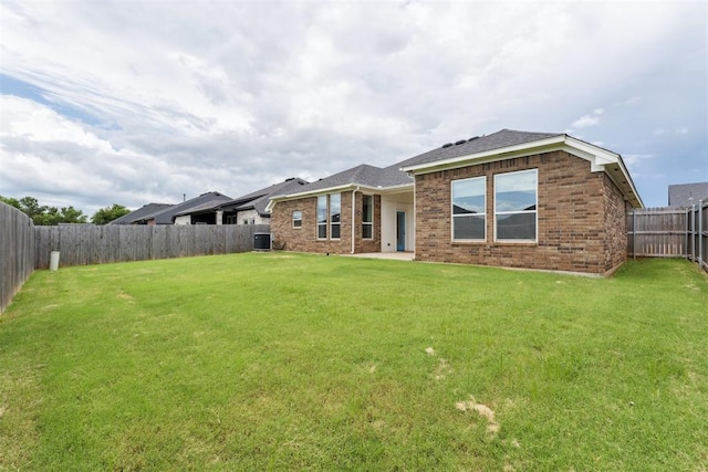 808 Scully Rd, Yukon, OK 73099 - back of property with a fenced backyard and brick siding
