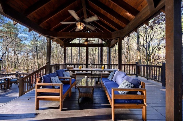 123 Hemlock Grove Rd, Hochatown, OK 74728 - wooden terrace with outdoor lounge area, ceiling fan, a gazebo, and view of wooded area