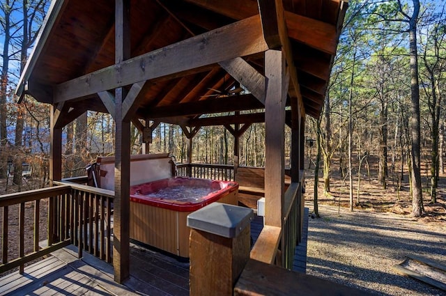 123 Hemlock Grove Rd, Hochatown, OK 74728 - wooden deck featuring a hot tub