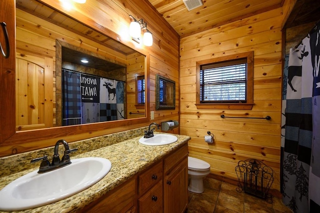 123 Hemlock Grove Rd, Hochatown, OK 74728 - bathroom featuring wooden ceiling, double vanity, wooden walls, a shower with curtain, and tile patterned flooring