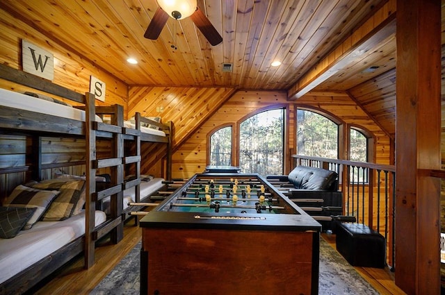 123 Hemlock Grove Rd, Hochatown, OK 74728 - playroom with wood ceiling, ceiling fan, wood finished floors, wood walls, and recessed lighting