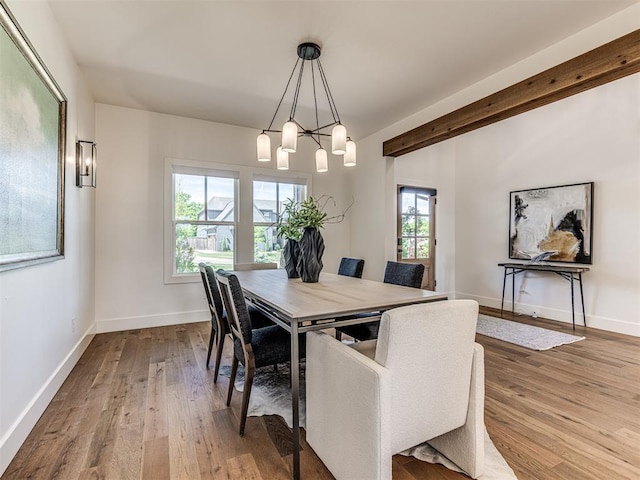 7308 Sunset Sail Ave, Edmond, OK 73034 - dining area with wood-type flooring and a chandelier