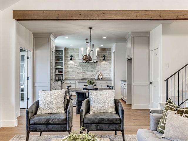7308 Sunset Sail Ave, Edmond, OK 73034 - living area featuring light wood finished floors, stairs, a chandelier, and recessed lighting