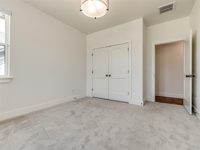 7308 Sunset Sail Ave, Edmond, OK 73034 - unfurnished bedroom with carpet and a closet