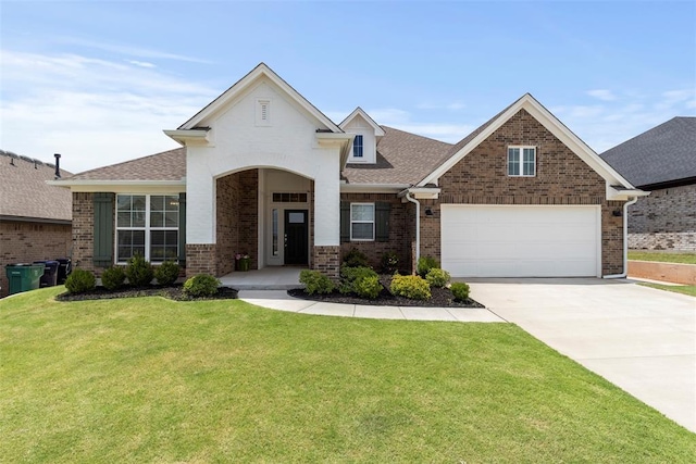 15921 Bison Dr, Moore, OK 73170 - view of front of property featuring brick siding, driveway, a front yard, and roof with shingles