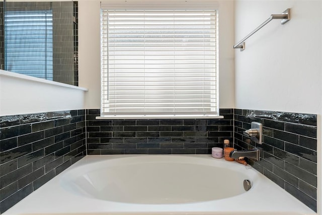 15921 Bison Dr, Moore, OK 73170 - bathroom featuring a bath and plenty of natural light