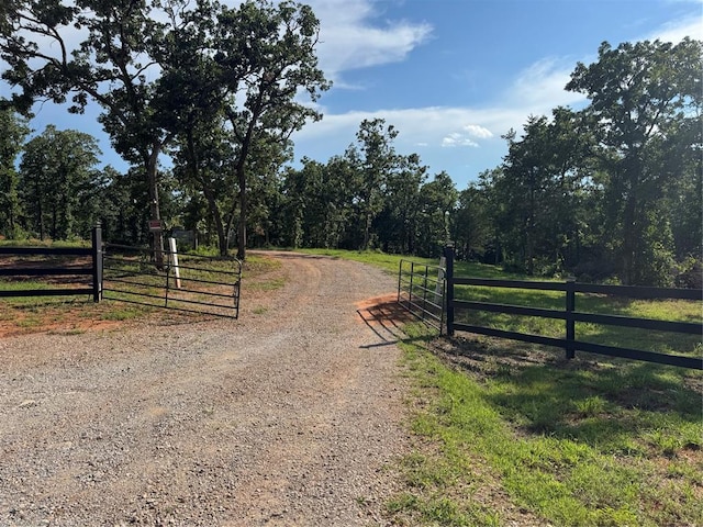 330633 E 875th Rd, Wellston, OK 74881 - view of street with a gate, a view of countryside, and a gated entry