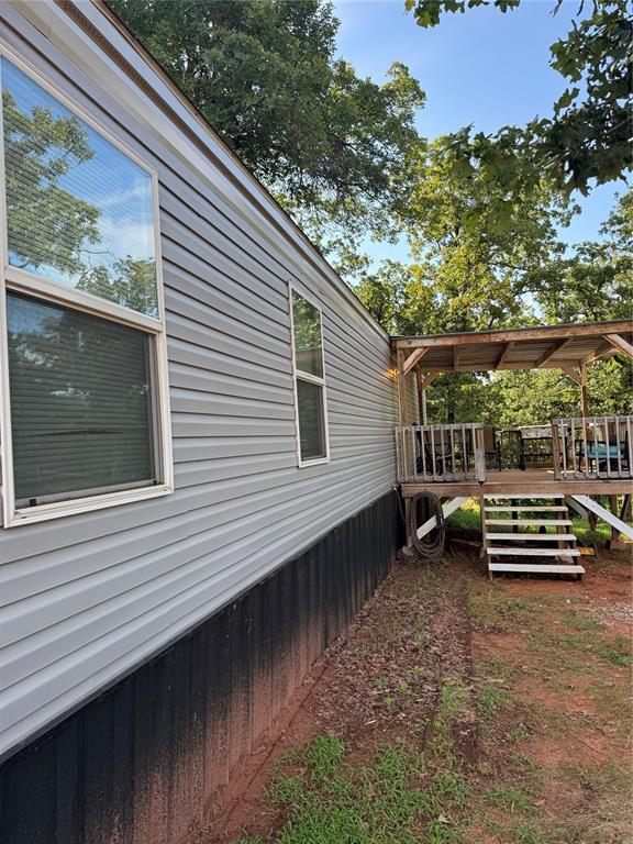 330633 E 875th Rd, Wellston, OK 74881 - view of property exterior with a deck