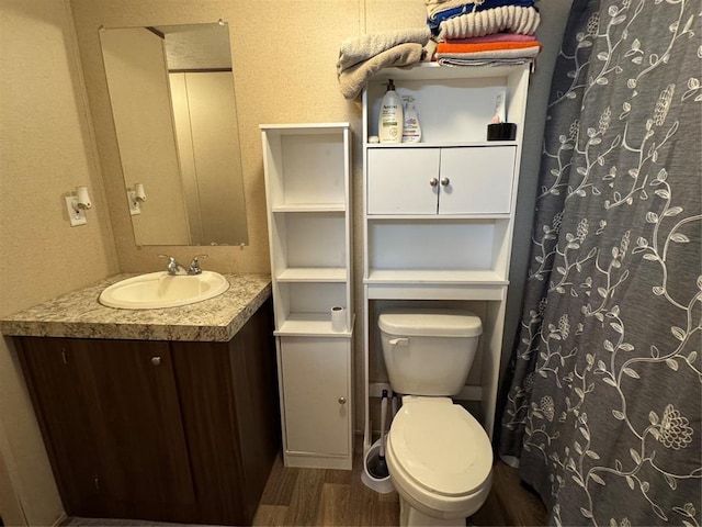 330633 E 875th Rd, Wellston, OK 74881 - bathroom featuring wood finished floors and vanity