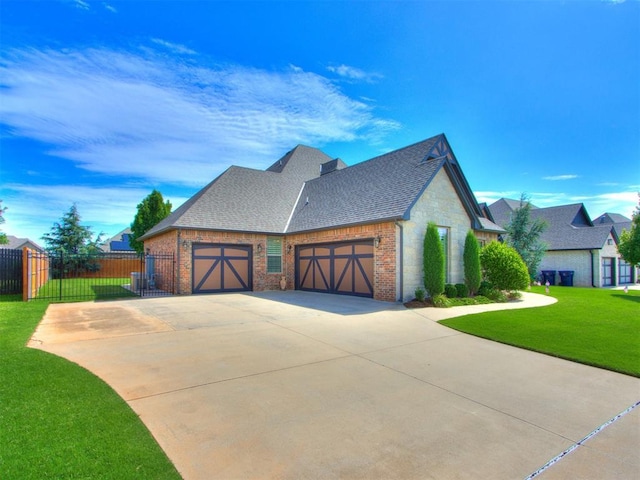 13308 NW 6th St, Yukon, OK 73099 - view of home's exterior with a shingled roof, driveway, brick siding, and a garage