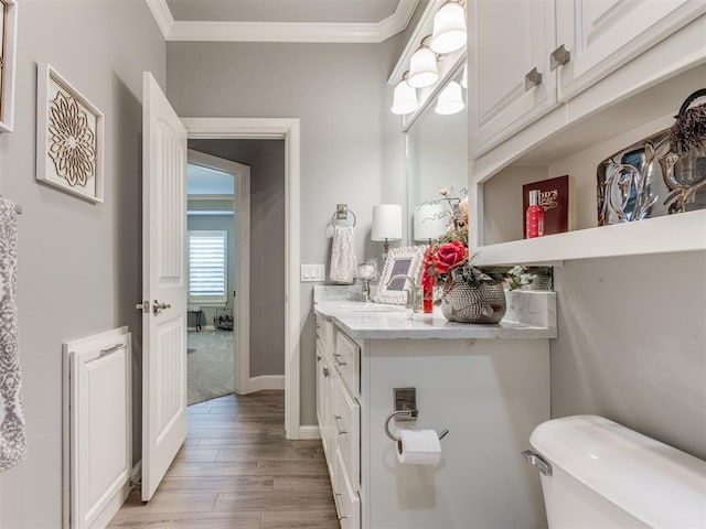 13308 NW 6th St, Yukon, OK 73099 - bathroom featuring crown molding, wood finished floors, and vanity