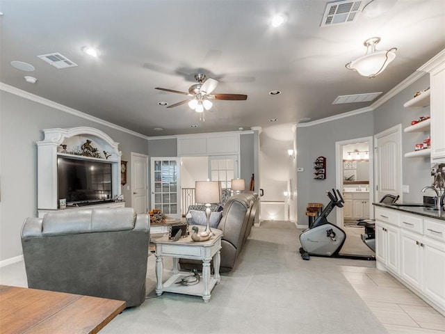13308 NW 6th St, Yukon, OK 73099 - living area featuring a ceiling fan, crown molding, light carpet, and recessed lighting