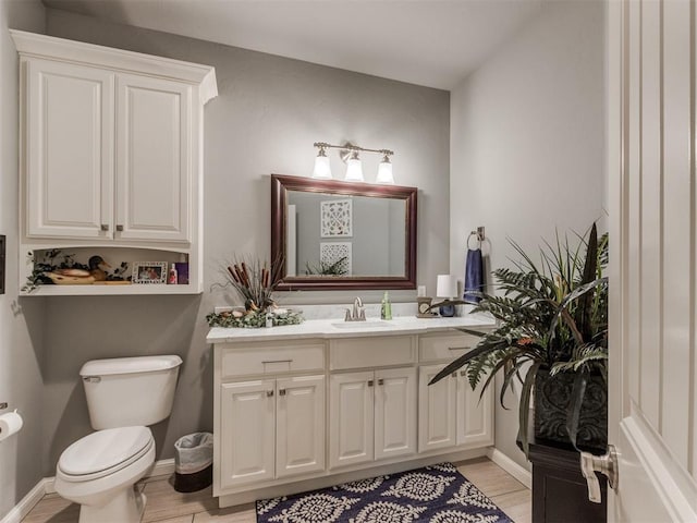 13308 NW 6th St, Yukon, OK 73099 - bathroom featuring vanity and wood finished floors