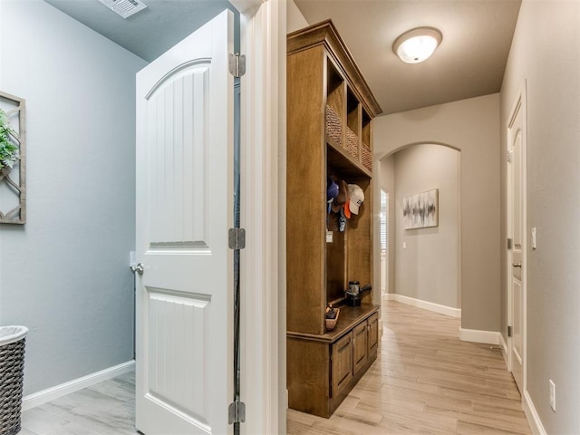 13308 NW 6th St, Yukon, OK 73099 - mudroom with arched walkways and light wood-style flooring