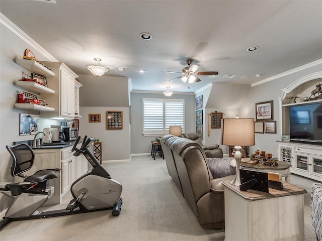 13308 NW 6th St, Yukon, OK 73099 - living room with ornamental molding, ceiling fan, light colored carpet, and recessed lighting