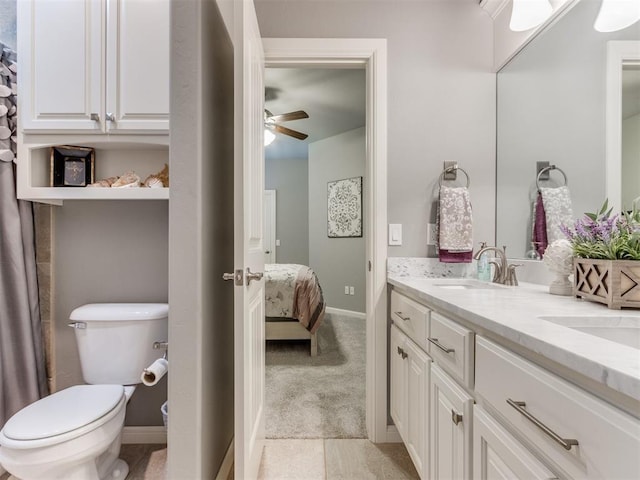 13308 NW 6th St, Yukon, OK 73099 - full bath featuring ceiling fan, double vanity, and ensuite bathroom