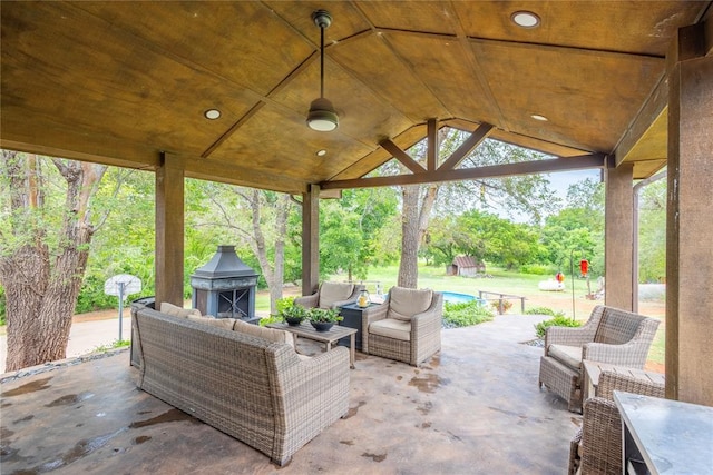 19277 E 1220th Rd, Sayre, OK 73662 - view of patio featuring an outdoor living space and a storage shed