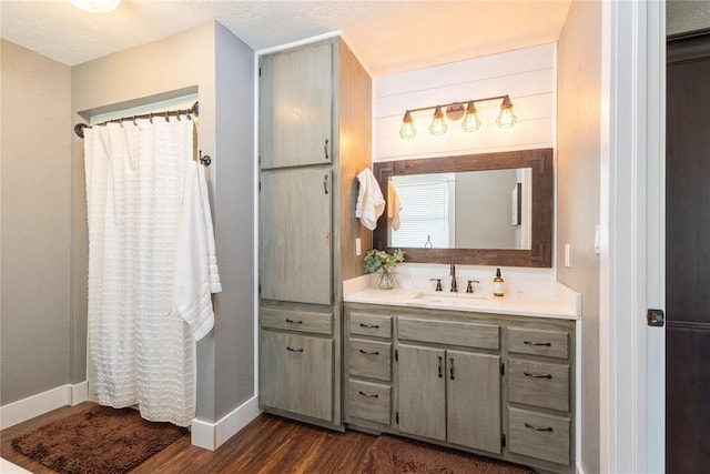 19277 E 1220th Rd, Sayre, OK 73662 - bathroom with vanity, wood finished floors, and a shower with curtain