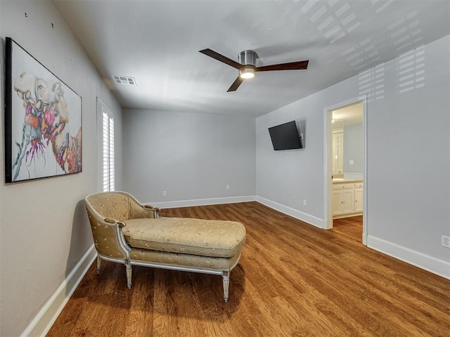 6432 Brandywine Ln, Oklahoma City, OK 73116 - living area with wood finished floors and a ceiling fan