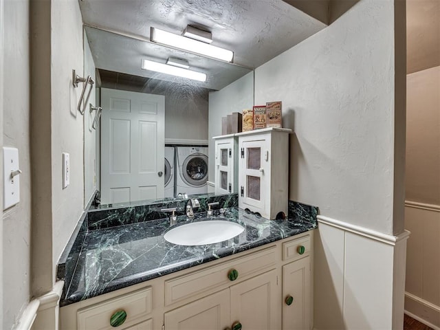 6432 Brandywine Ln, Oklahoma City, OK 73116 - bathroom with independent washer and dryer and vanity