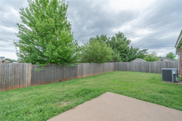2412 NW 164th Ter, Edmond, OK 73013 - fenced backyard featuring a patio area