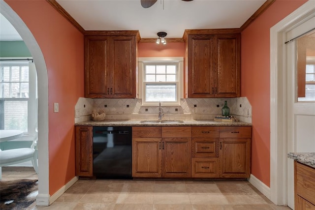 217 NW 30th St, Oklahoma City, OK 73118 - kitchen featuring black dishwasher, brown cabinetry, tasteful backsplash, and ornamental molding