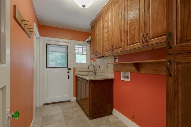 217 NW 30th St, Oklahoma City, OK 73118 - laundry room with cabinet space and hookup for a washing machine