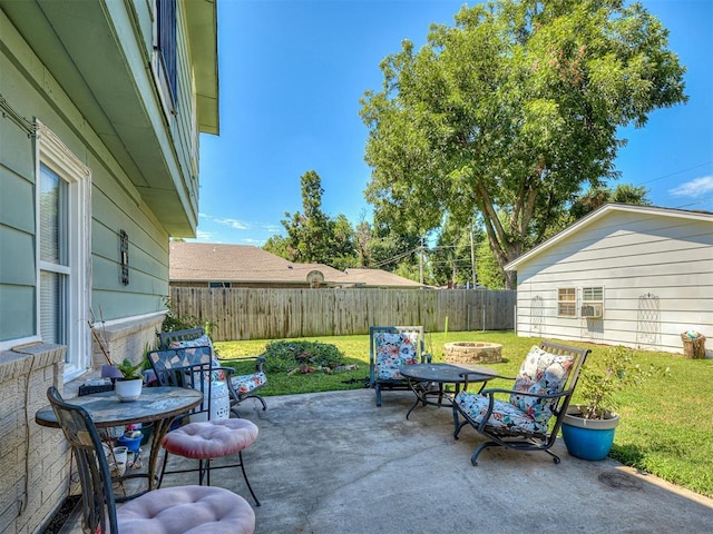 4603 N Wheeler Ave, Bethany, OK 73008 - fenced backyard with a patio area and an outdoor fire pit