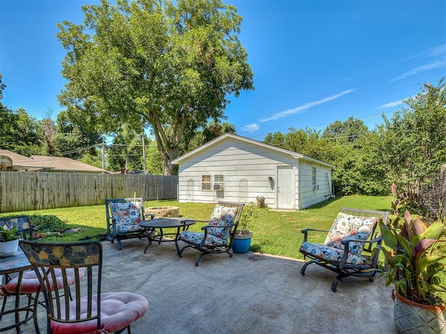 4603 N Wheeler Ave, Bethany, OK 73008 - fenced backyard with a patio area and an outbuilding