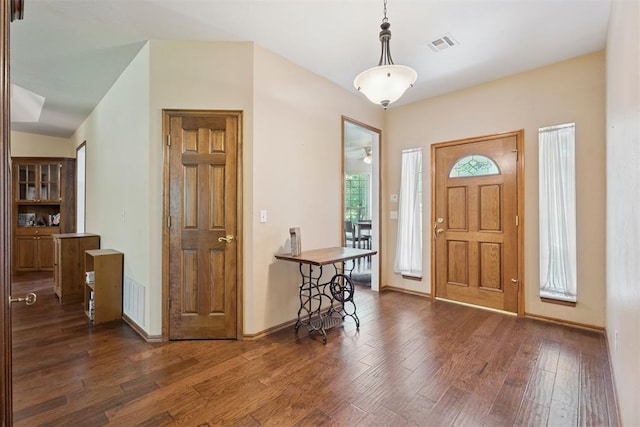14601 Billy Dr, Edmond, OK 73034 - foyer with dark wood-style floors and baseboards