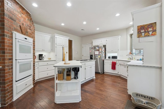 14601 Billy Dr, Edmond, OK 73034 - kitchen featuring white appliances, open shelves, white cabinets, light countertops, and recessed lighting