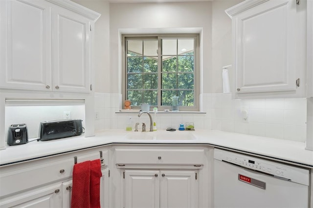 14601 Billy Dr, Edmond, OK 73034 - kitchen with white dishwasher, tasteful backsplash, white cabinets, and light countertops