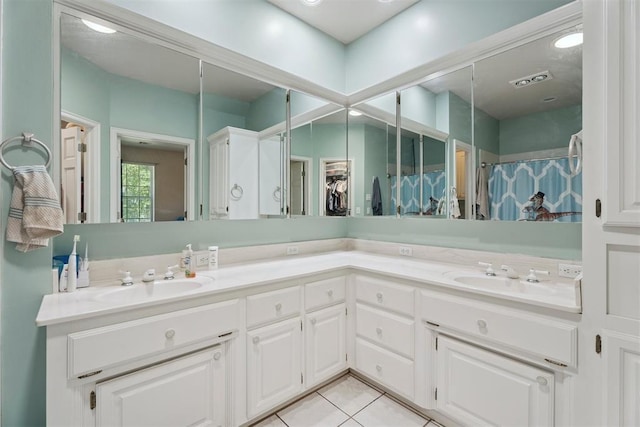 14601 Billy Dr, Edmond, OK 73034 - full bath featuring double vanity, tile patterned flooring, and a shower