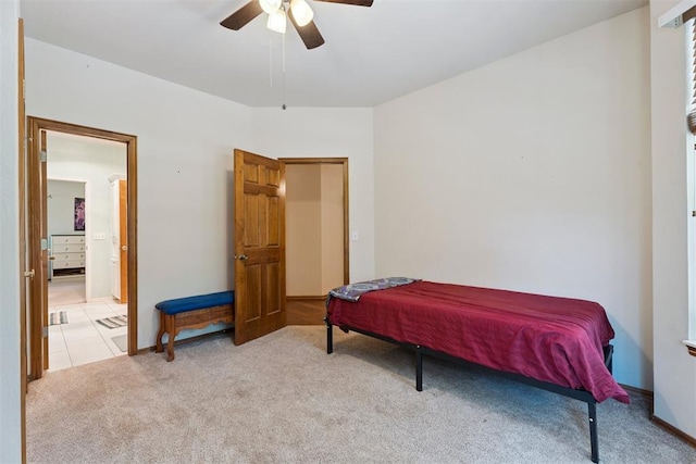 14601 Billy Dr, Edmond, OK 73034 - bedroom with light carpet, ceiling fan, and connected bathroom