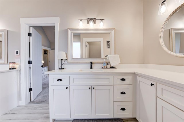 14716 Turkey Hills Rd, Newalla, OK 74857 - bathroom featuring vanity and wood finished floors