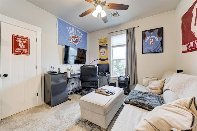 14716 Turkey Hills Rd, Newalla, OK 74857 - carpeted living room featuring a ceiling fan and a desk