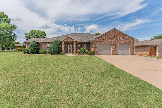 105 Kimberling Dr, Moore, OK 73160 - single story home featuring an attached garage, brick siding, a front yard, and driveway