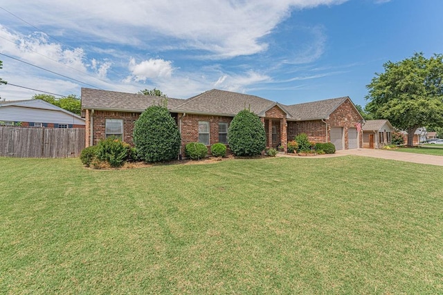 105 Kimberling Dr, Moore, OK 73160 - ranch-style home featuring brick siding, a garage, concrete driveway, and roof with shingles