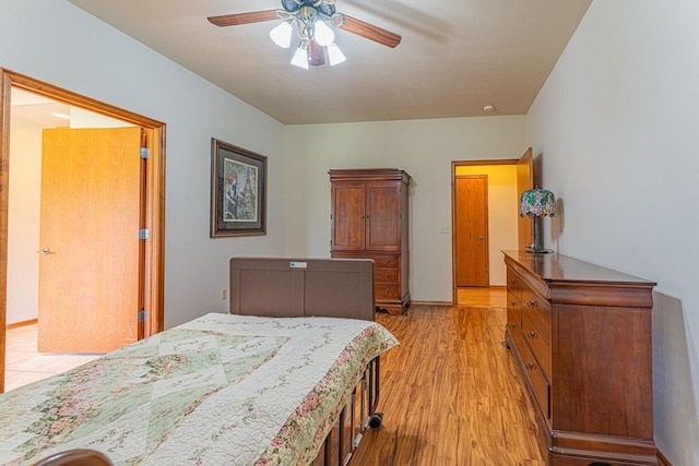 105 Kimberling Dr, Moore, OK 73160 - bedroom with light wood-style flooring and ceiling fan