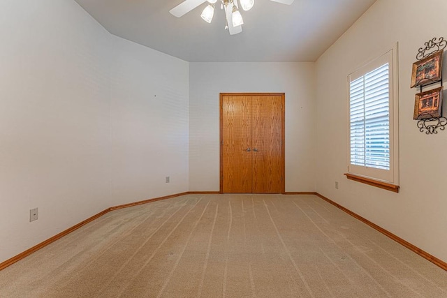 105 Kimberling Dr, Moore, OK 73160 - spare room with a ceiling fan and light colored carpet
